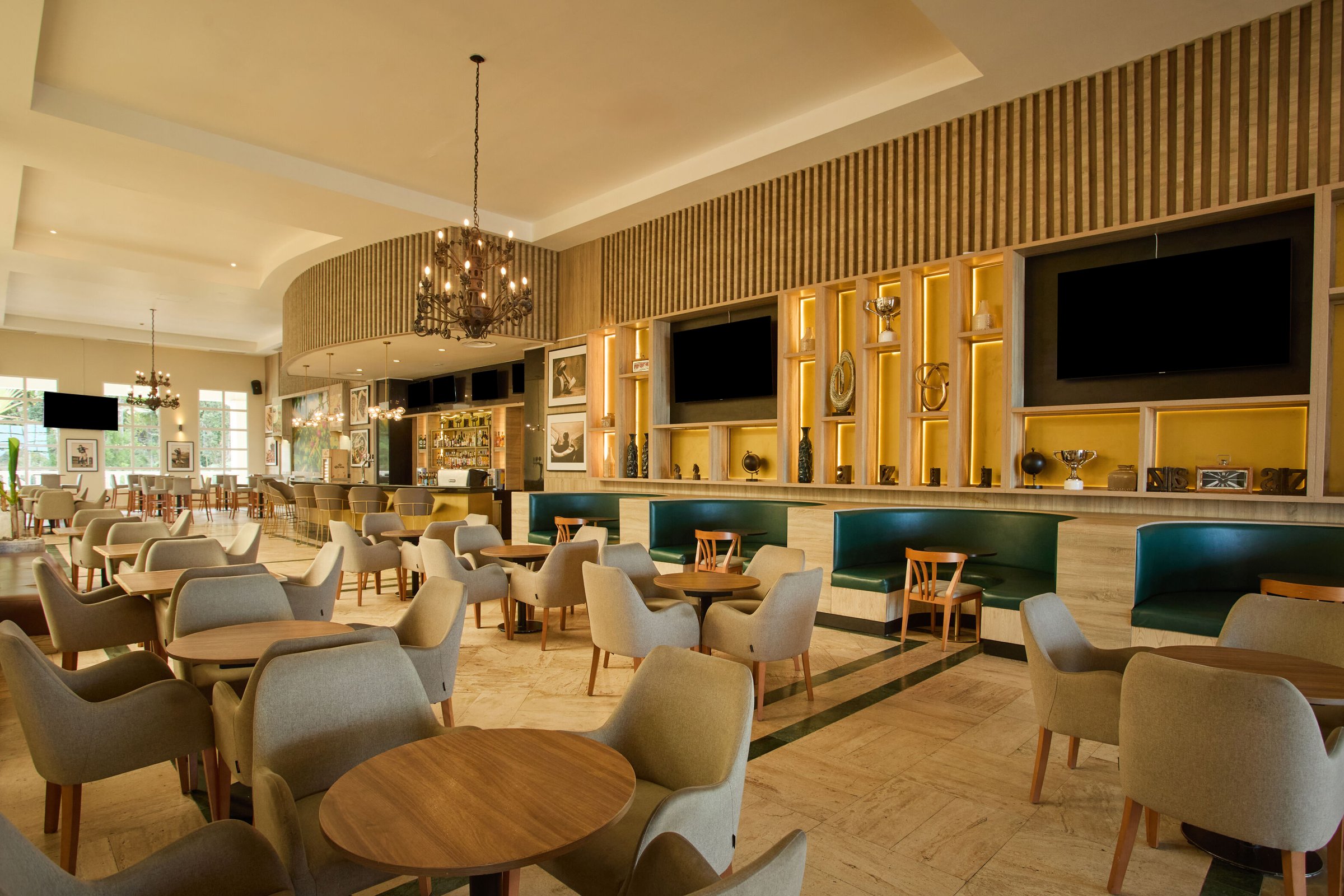 Sports bar with lounge seating, booths and wall-mounted TVs