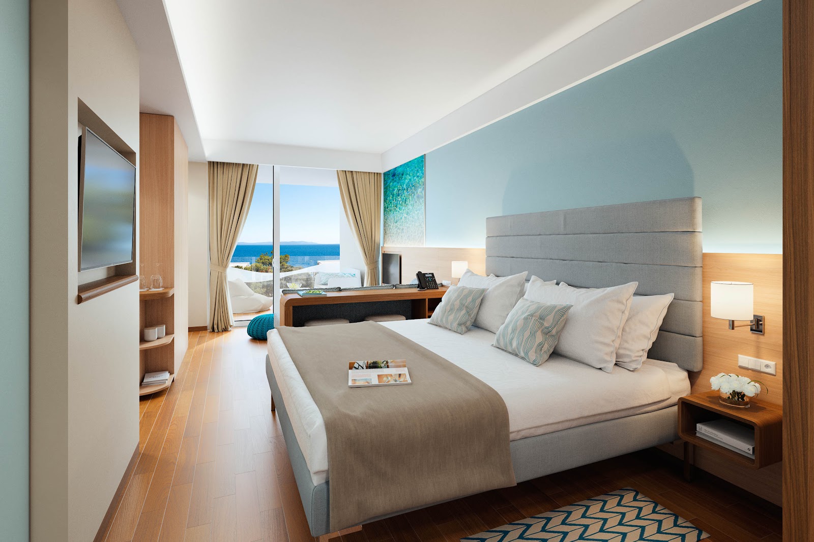 Resort bedroom with ocean view through balcony doors, gray upholstered bed, wooden flooring, and turquoise accent wall.