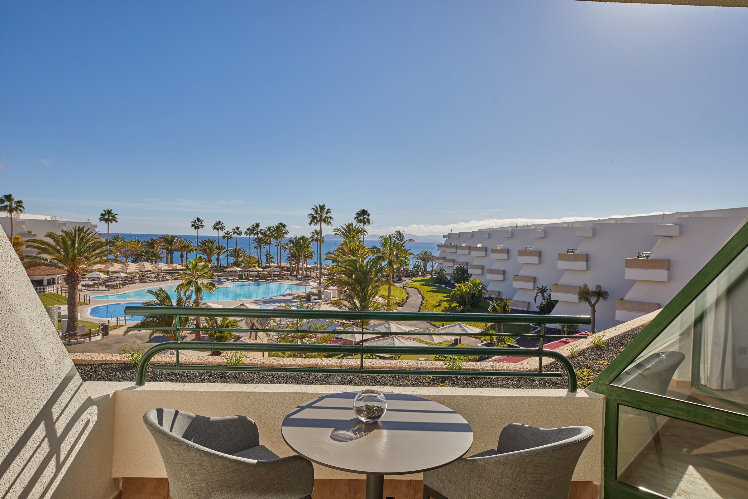 Suite balcony with ocean and resort view