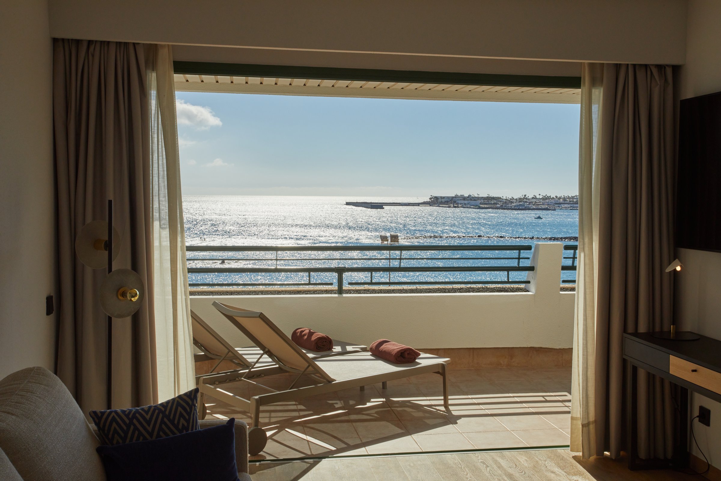 Master suite terrace with loungers and ocean view