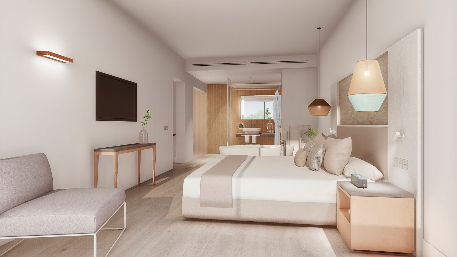Modern resort room with king bed, pendant lights, wall-mounted TV, seating area, and open bathroom with tub visible beyond.