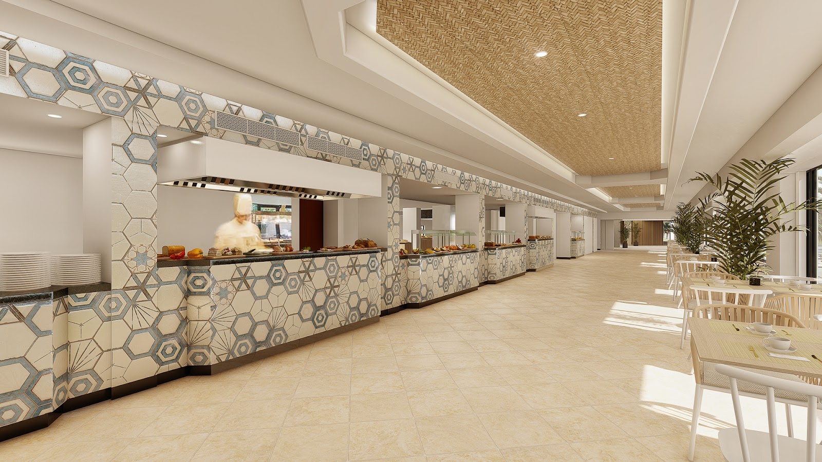 Spacious resort dining hall with geometric-patterned serving counter, chef preparing food, white chairs, and potted plants along the side.