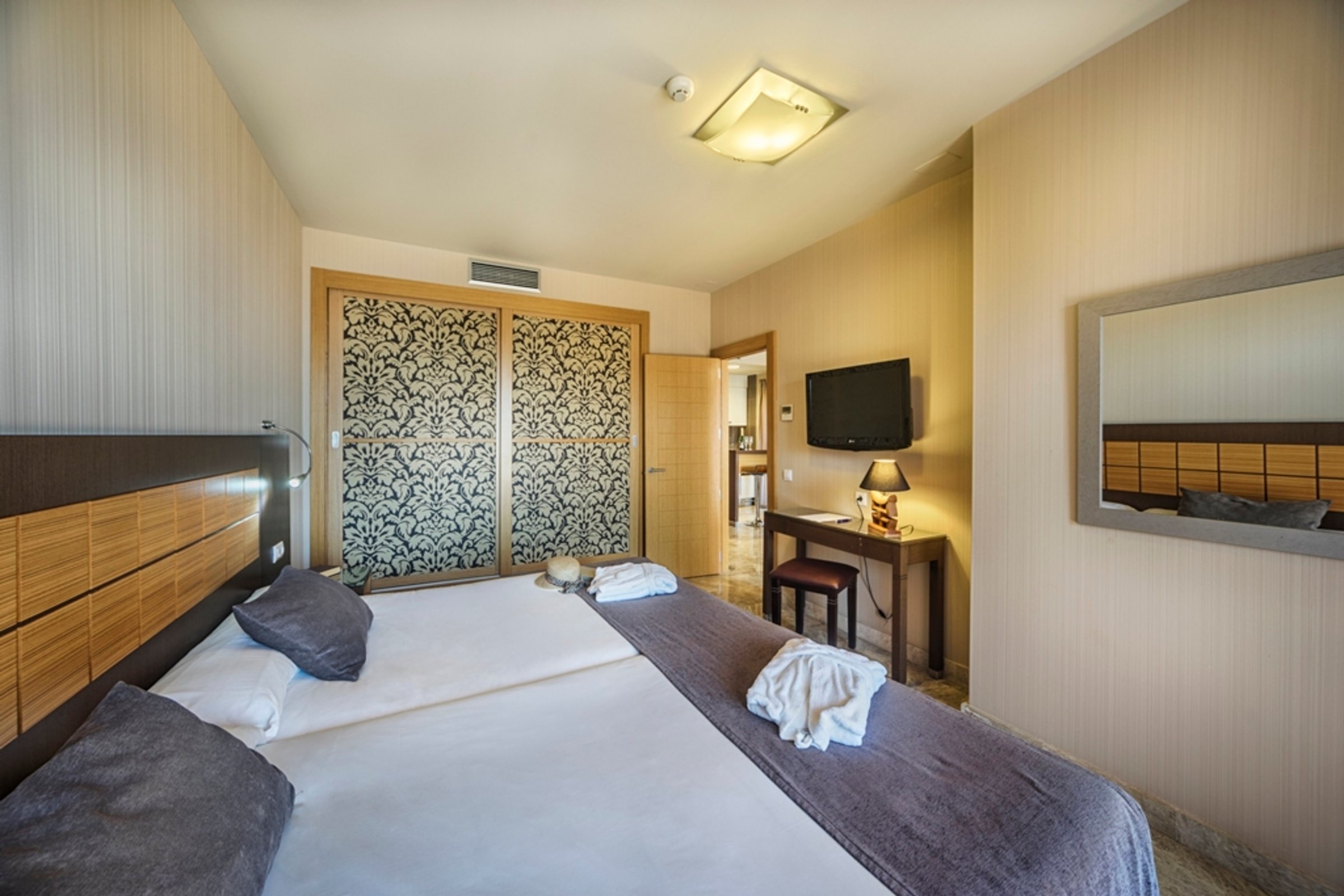Junior suite bedroom with built-in wardrobe