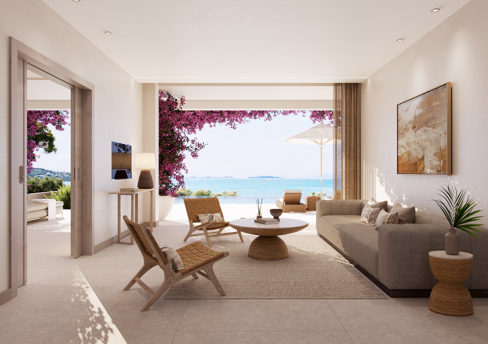 Spacious suite at Ikos Odisia with cream furnishings, wooden chairs, and expansive windows overlooking turquoise sea and magenta bougainvillea.