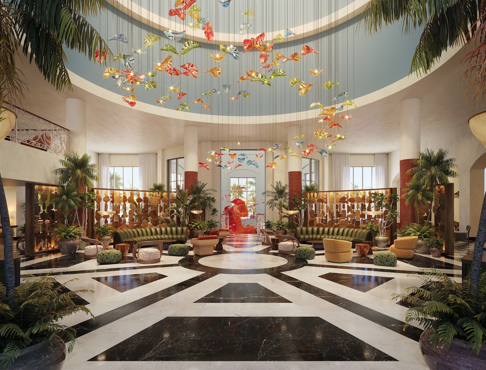 Circular resort lobby with high domed ceiling, hanging colorful bird sculptures, marble geometric floor, seating areas with potted plants, and natural light from arched windows.