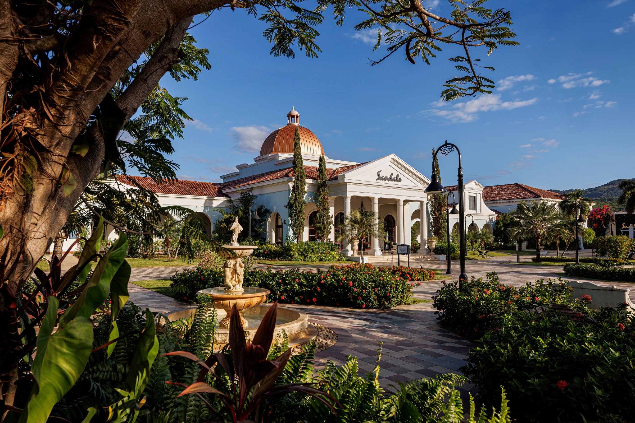 Fountain garden before the domed Sandals entrance building.
