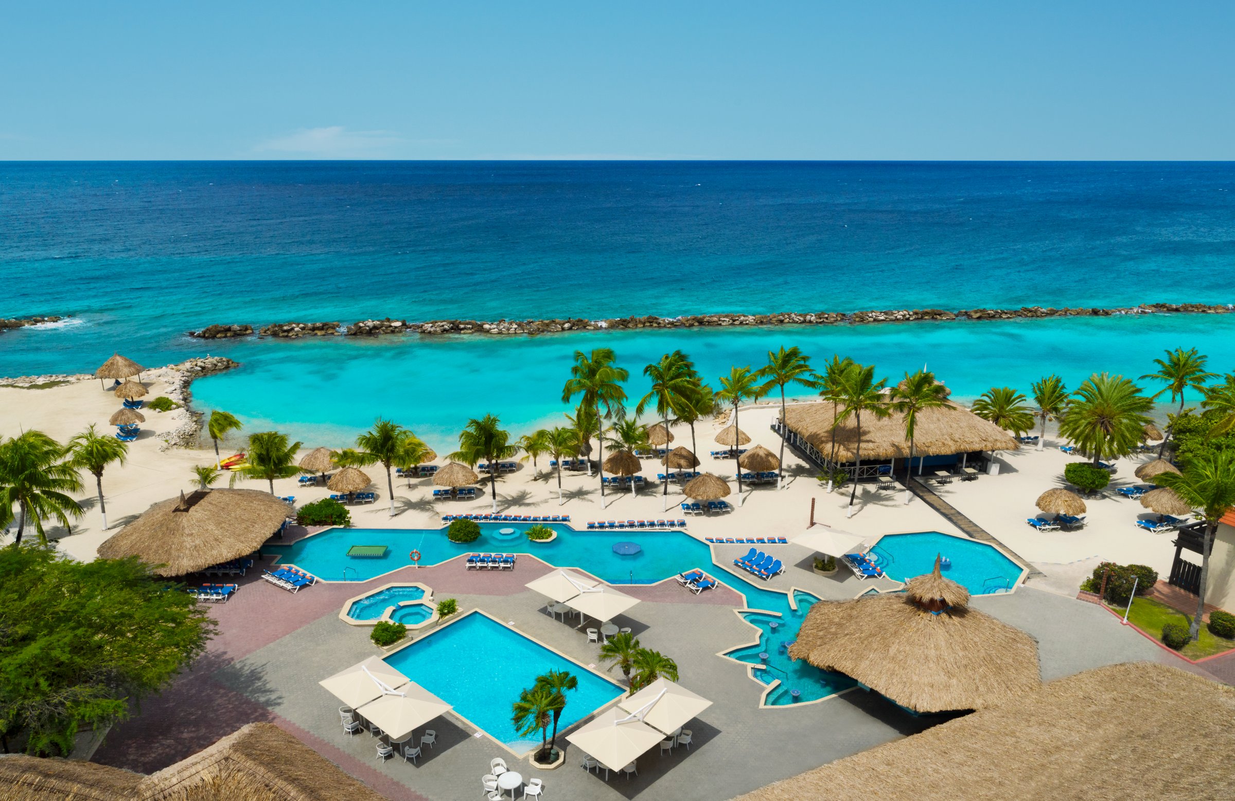 Aerial view of the main pool complex and beach